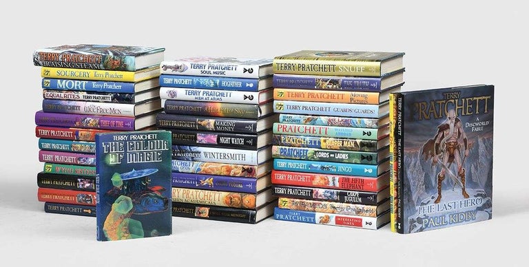 Item #9559 The Complete Discworld Series. Terry Pratchett.